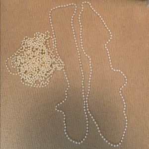Two imitation pearl necklaces